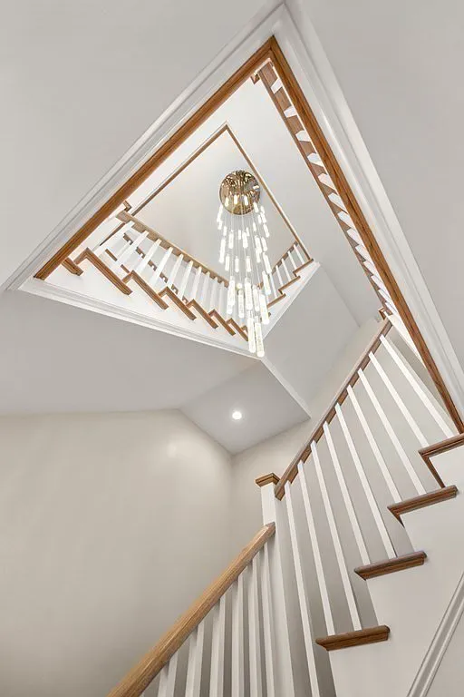 A picture of handrails with wood balusters