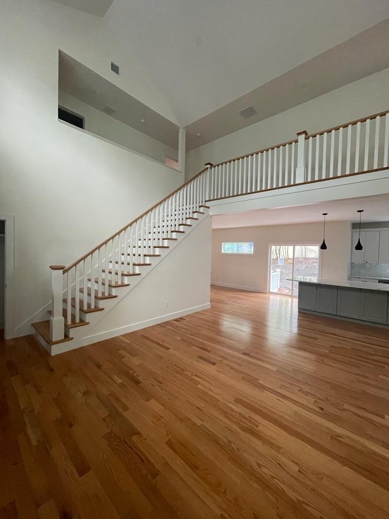 A picture of stair with wood balusters and newel posts